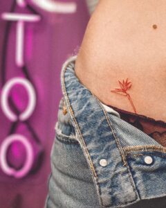 Bird of Paradise Flower Hip Tattoo