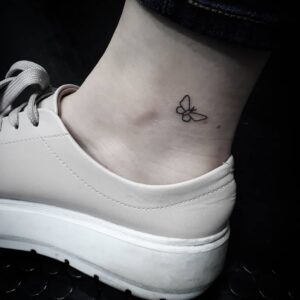Butterfly Outline Ankle Tattoo