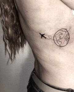 Airplane Flying Around the World Side Tattoo