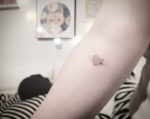 Heart with Airplane Forearm Tattoo