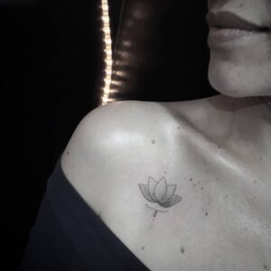 Lotus Flower Collarbone Tattoo