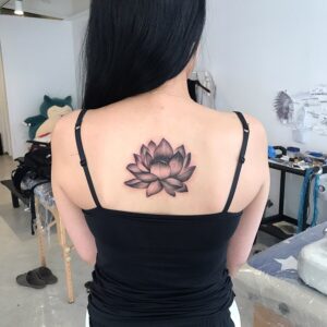Illustrative Lotus Flower Back Tattoo