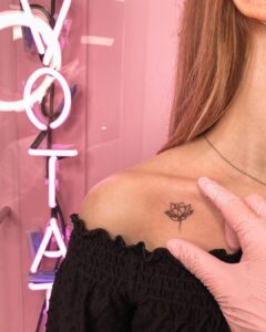 Lotus Flower Collarbone Tattoo