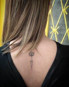 Lotus Flower and Unalome Upper Back Tattoo