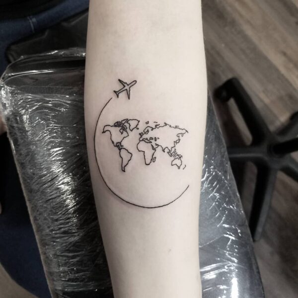 Airplane Circling the World Forearm Tattoo