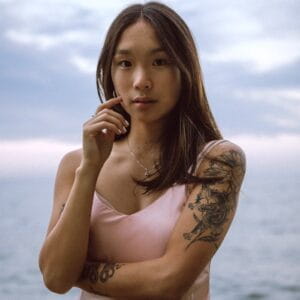asian woman with tattoos