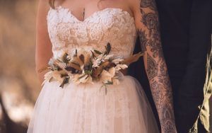 Woman with tattoos as a wedding bride