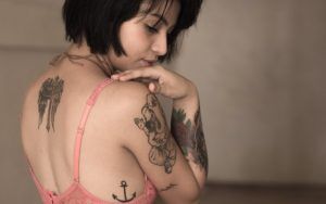 woman with multiple tattoos