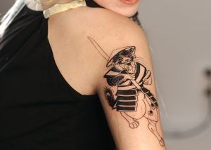 Woman with illustrative tattoo