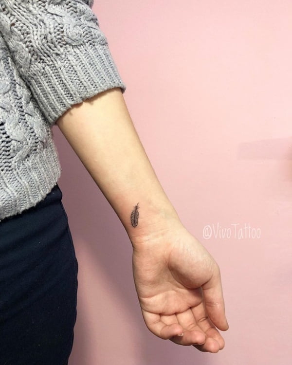 Mini Feather Fine Line Wrist Tattoo Mini Feather Fine Line Wrist Tattoo